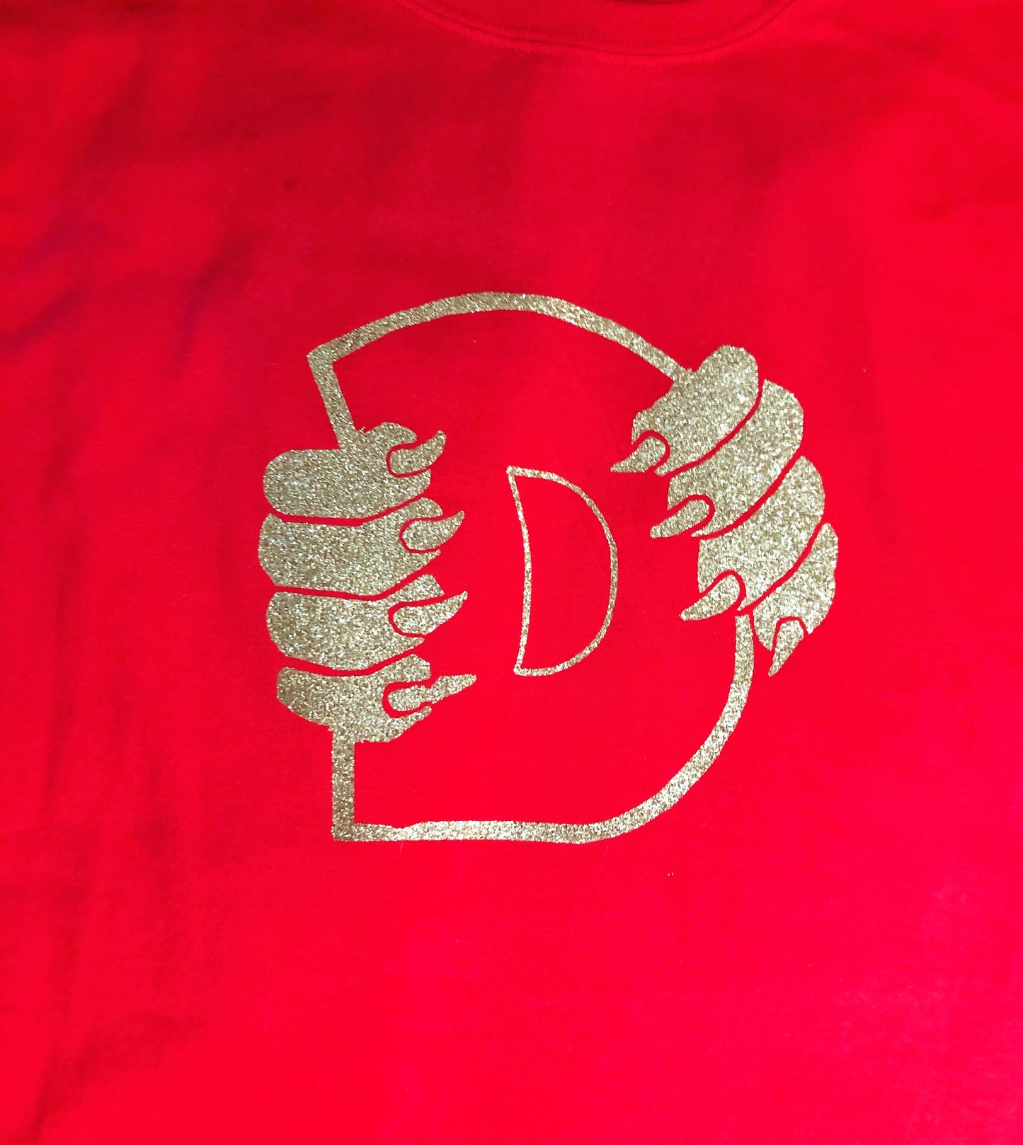 Red T-shirt with Gold Glitter Logo