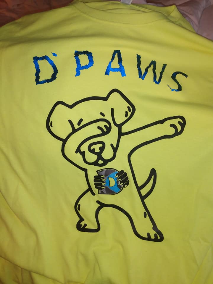 Yellow T-shirt with Blue Camouflage Outline of Dog